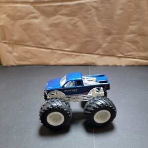 Blue and White Monster Truck Toy with Oversized Wheels